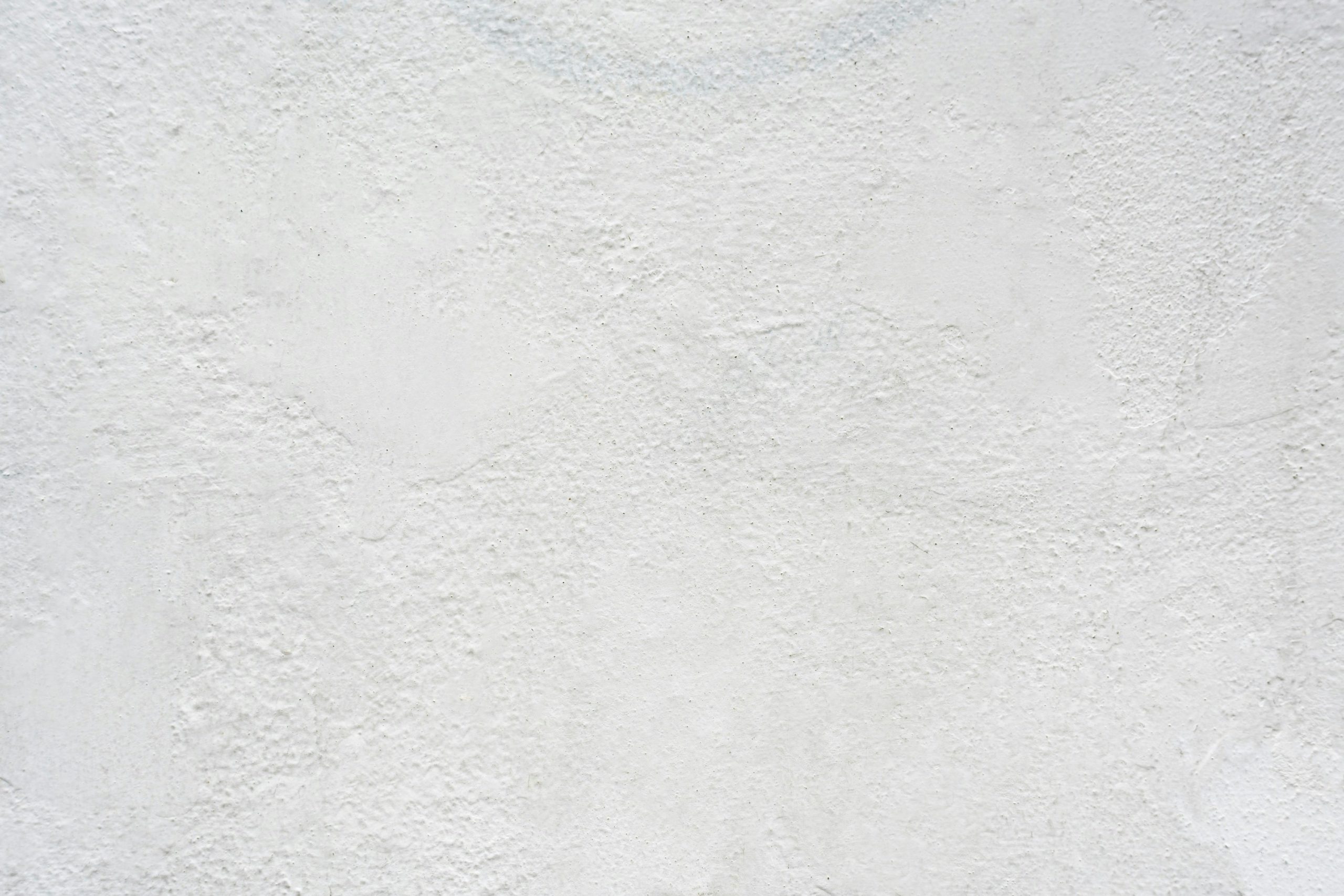 Echantillon de peinture à la chaux blanche à l'aspect texturé